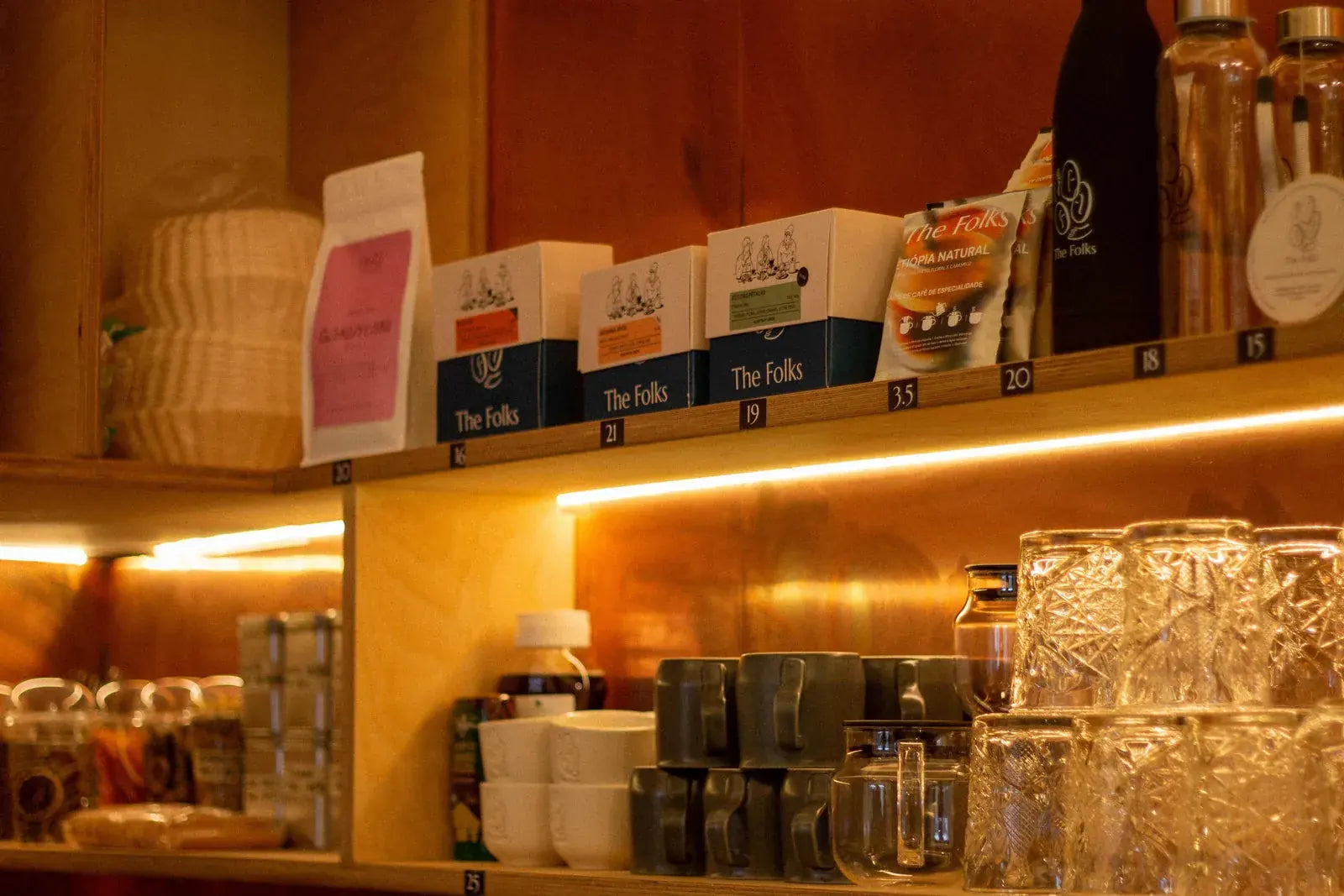 Warm shelf of coffee bags at The Folks